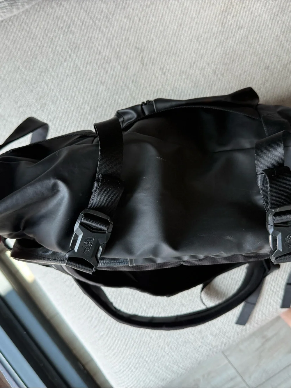 The North Face Black Roll-Top Travel Backpack